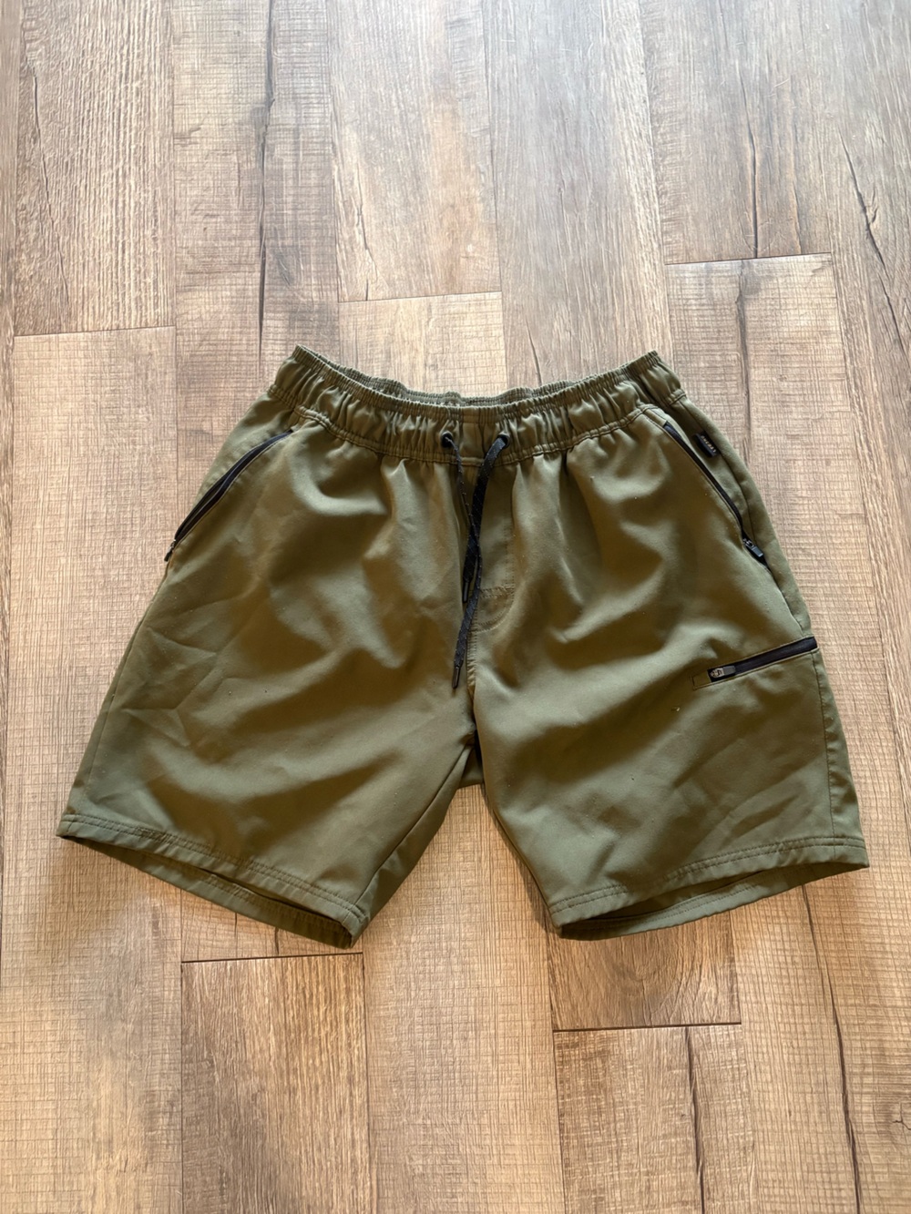 Discovery Olive Green Athletic Shorts with Zippered Pockets